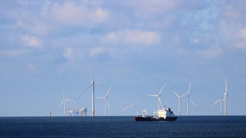 Oil tanker sailing on the sea under a cloudy sky