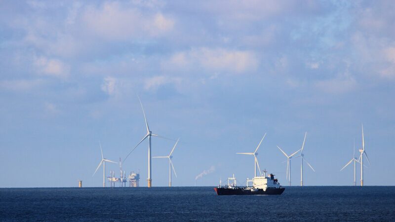 Oil tanker sailing on the sea under a cloudy sky